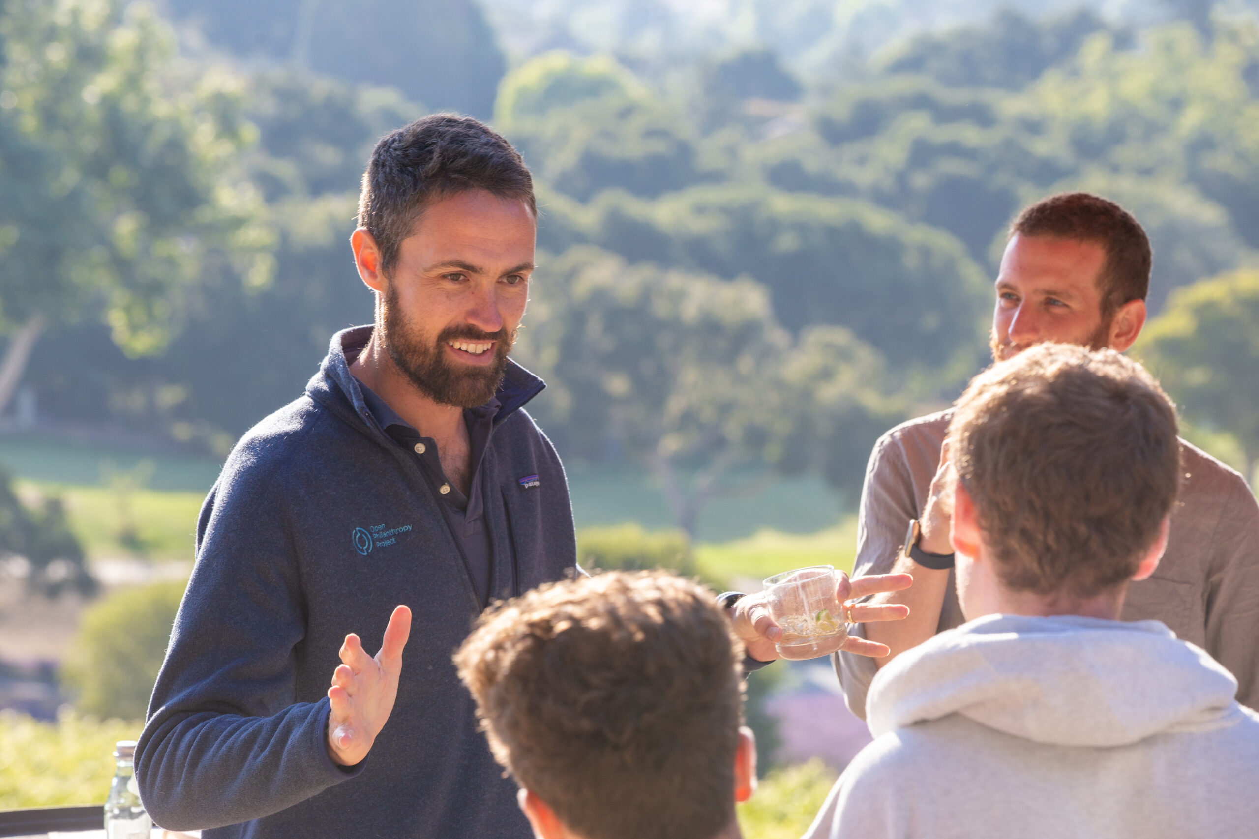 Group of staff talking at team retreat