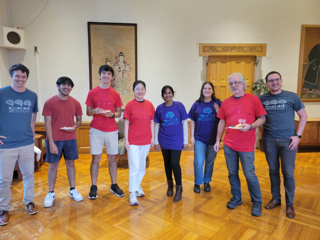 Brodeur (far left) and other participants in the 2024 Cornell-AI Replication Games.