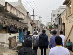 Japanese participants tour a village. 